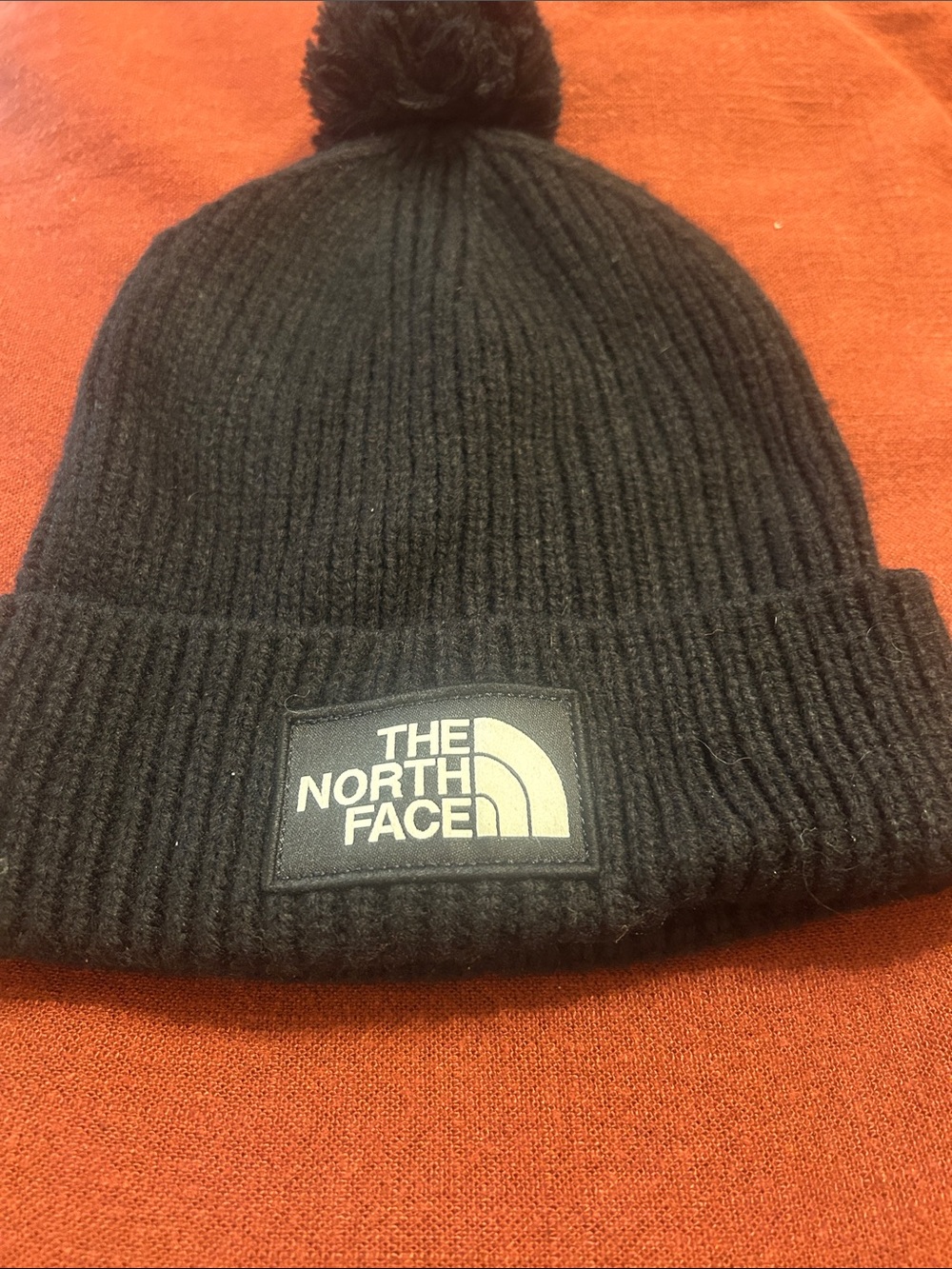 The North Face Black Pom Cuffed Beanie with Logo Patch